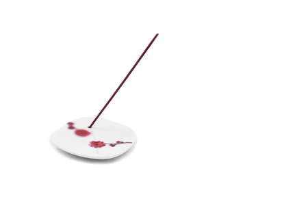 Aroma sticks stock images. Aroma sticks on ceramic stand isolated on a white background. Japanese Incenseの写真素材