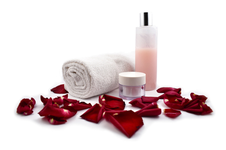 Rose cosmetics stock images. Rose cosmetics on a white background. Rose petals with cosmeticsの写真素材