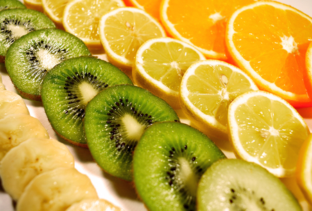 Citrus slices stock images. Different slices of fruits. Yellow fruit on a white background. Collection of fruits. Fresh sliced citrus fruitsの写真素材