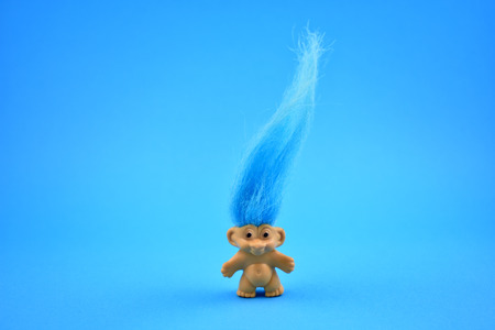Troll stock images. Elf on a blue background. Troll with blue hairの写真素材