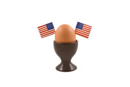Egg with american flag stock images. American breakfast. Egg decoration. Boiled egg on a white backgroundの写真素材