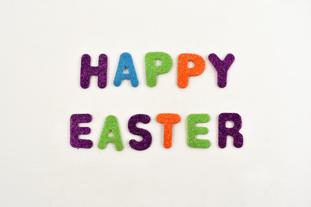 Happy Easter stock images. Colored inscription Happy Easter. Happy Easter sign on a white backgroundの写真素材