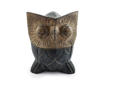 Owl wooden decoration stock images. Owl statue isolated on white background. Owl home decorの写真素材