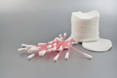 Cotton cosmetic tools stock images. Cotton wool sticks. Plastic Ear Sticks. Cotton wool sticks isolated on a silver backgroud. Cotton pads imagesの写真素材