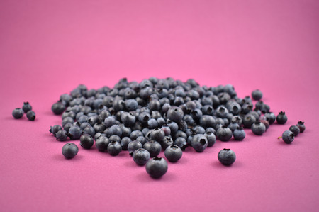 Blueberries stock images. Blueberries on a purple background. Healthy summer fruitの写真素材