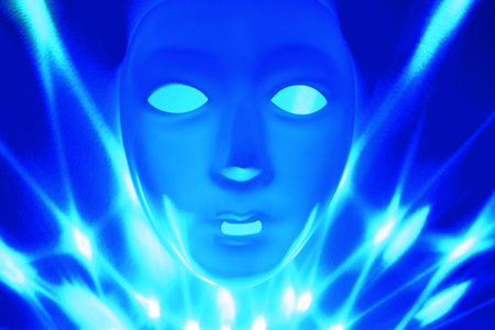 Blue dramatic mask stock images. Plastic human mask. Blank male mask Halloween. Mental illness...