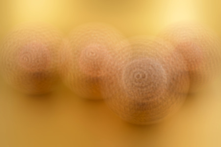 Abstract gold Christmas background stock images. Elegant holiday background. Shiny golden backdrop with Christmas ballの写真素材