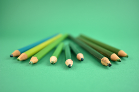 Green crayons stock images. Set of green crayons on green background. Art supplies imagesの写真素材