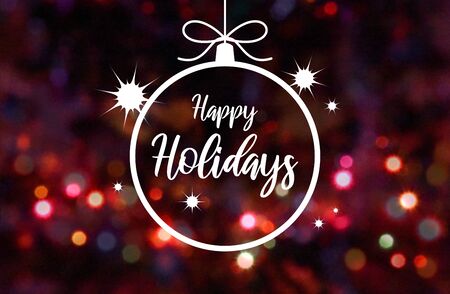 Happy Holidays sign with blur effect. Colorful blurred bokeh wallpaper. Festive blur backdrop. Christmas greeting card. Christmas background. Xmas bauble imagesの写真素材