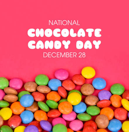 National Chocolate Candy Day stock images. Round sweets on a pink background stock photo. Chocolate...