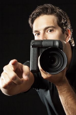 Photographer on black.の写真素材