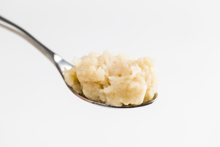 cocada,(coconut sweet) a  typical Brazilian sweet on a spoon.の写真素材