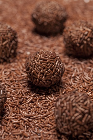 Brigadeiro a brazilian sweet over chocolate sprinkles.の写真素材