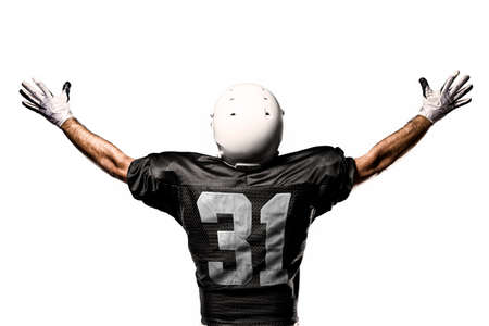 Football Player with a black uniform, on a white backgroundの写真素材