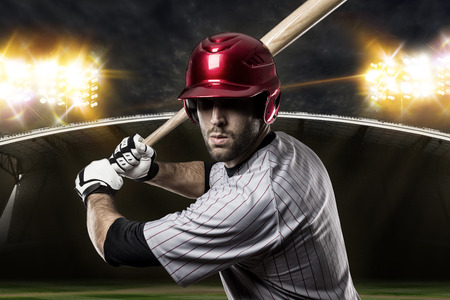 Baseball Player on a baseball Stadium.