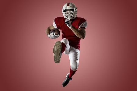 Football Player with a red uniform Running on a red background.