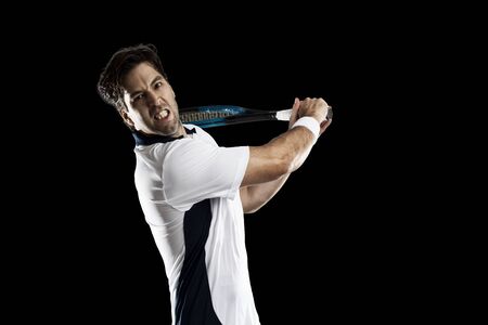 Tennis player playing on a black background.