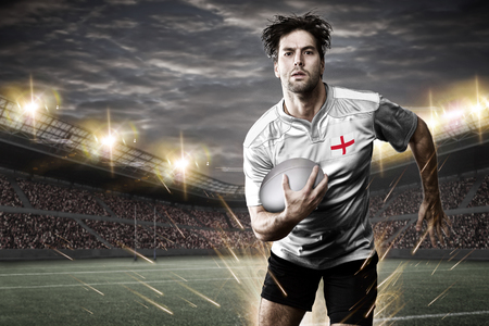 English rugby player, wearing a white unifrme in a stadium.の写真素材