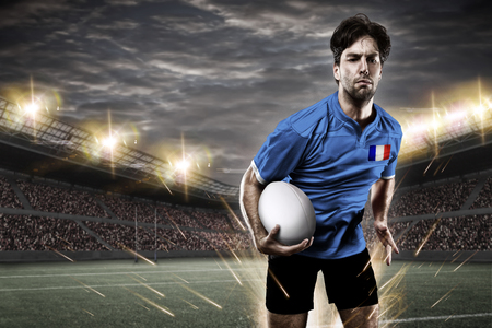 French rugby player, wearing a blue uniform in a stadium.の写真素材