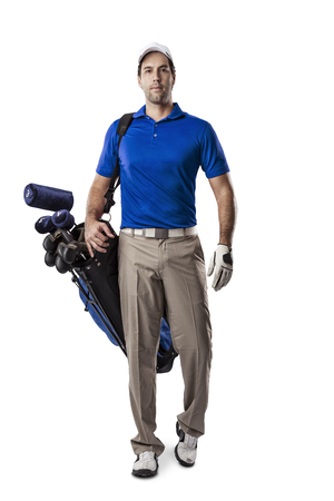 Golf Player in a blue shirt walking with a bag of golf clubs on his back, on a white Background.の写真素材