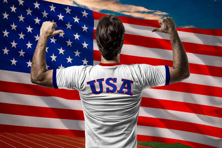 American Athlete in front of a american flag.の写真素材