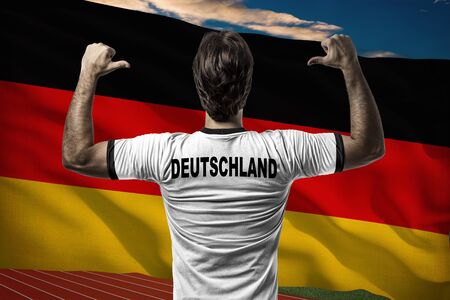 German Athlete in front of a German flag.の写真素材