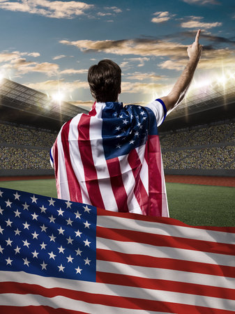 American Athlete with a american flag in front.の写真素材
