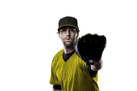 Baseball Player with a yellow uniform on a white background.の写真素材