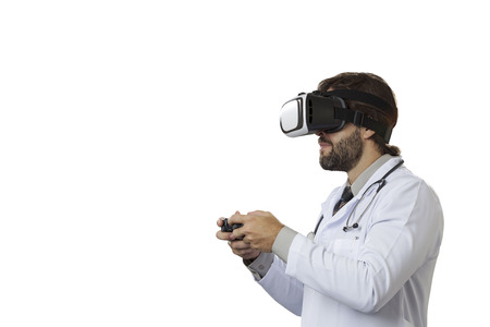Male doctor using a Virtual Reality Glasses on a White background.