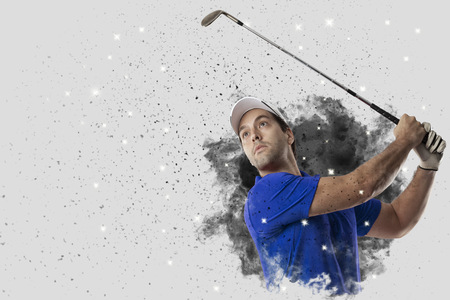 Golf Player with a blue uniform coming out of a blast of smoke .の写真素材