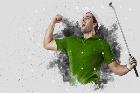 Golf Player with a green uniform coming out of a blast of smoke .の写真素材