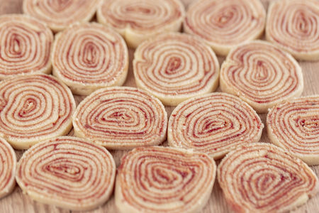 Bolo de rolo (swiss roll, roll cake) typical Brazilian dessert, from the state of Pernambuco. Sliced...