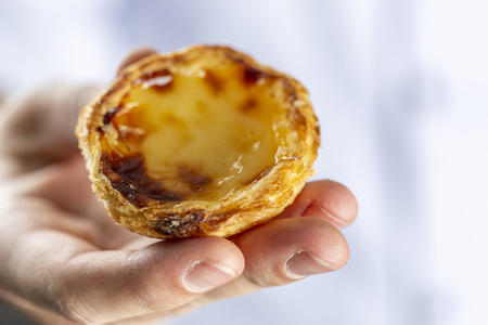Typical Portuguese custard pies - Pastel de Nata or Pastel de Belem. traditional portuguese pastry....