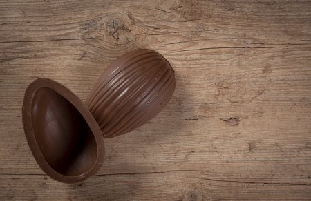 Brazilian Chocolate Easters eggs, on a wooden table.の写真素材