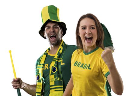 Brazilian couple Celebrating on a white background.の写真素材