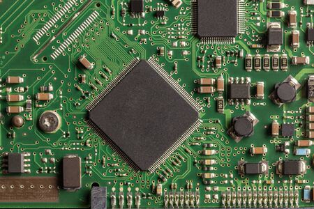 Photo of a green circuit board. photo for background.