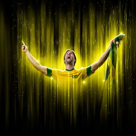 Brazilian soccer player, on a yellow and black background.の写真素材