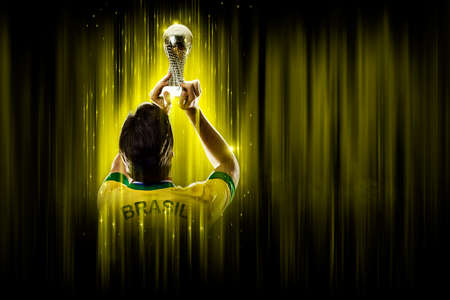 Brazilian soccer player, on a yellow and black background.の写真素材