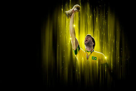 Brazilian soccer player, on a yellow and black background.の写真素材