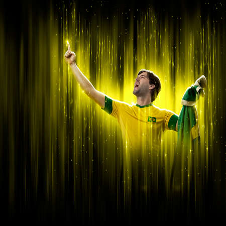 Brazilian soccer player, on a yellow and black background.の写真素材