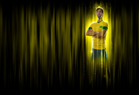 Brazilian soccer player, on a yellow and black background.の写真素材