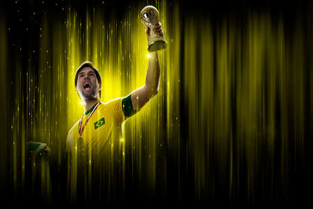 Brazilian soccer player, on a yellow and black background.の写真素材