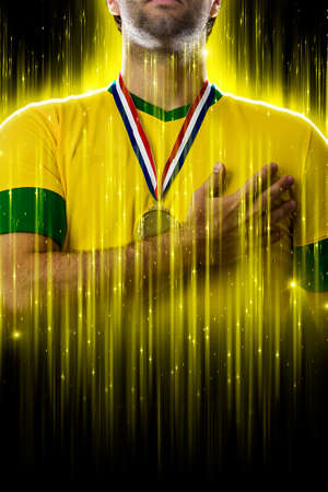 Brazilian soccer player, on a yellow and black background.の写真素材