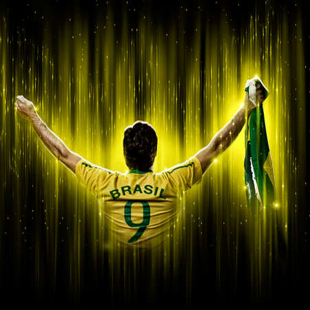 Brazilian soccer player, on a yellow and black background.の写真素材