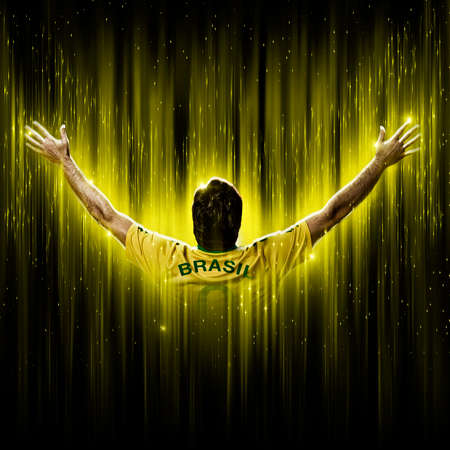 Brazilian soccer player, on a yellow and black background.の写真素材