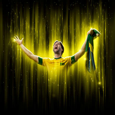 Brazilian soccer player, on a yellow and black background.の写真素材
