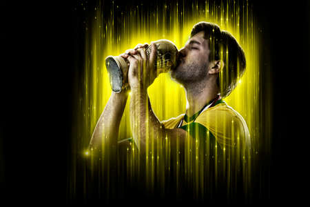 Brazilian soccer player, on a yellow and black background.の写真素材