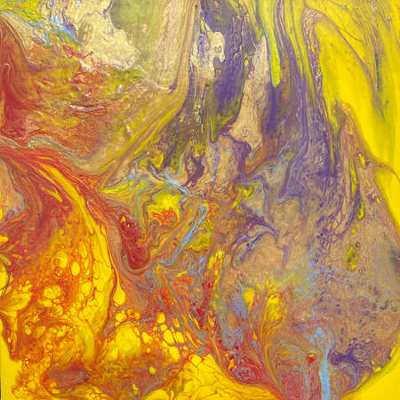 Photograph of a neon yellow fluid acrylic artwork.の写真素材