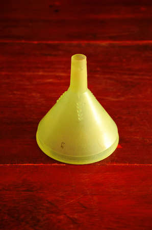 Funnel on wooden tableの写真素材
