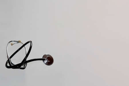 A place for recording, a medical object on a gray background. Medical equipment, top view, gray background, light background. Empty space.の写真素材